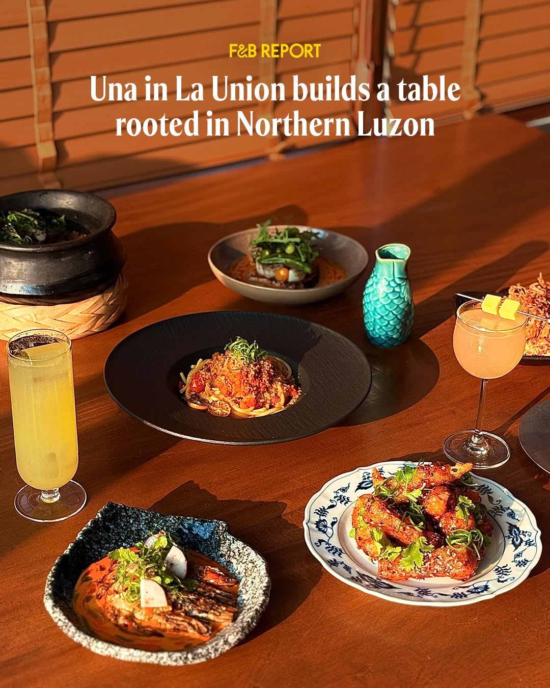 UNA table spread — multiple dishes and cocktails, F&B Report press photo